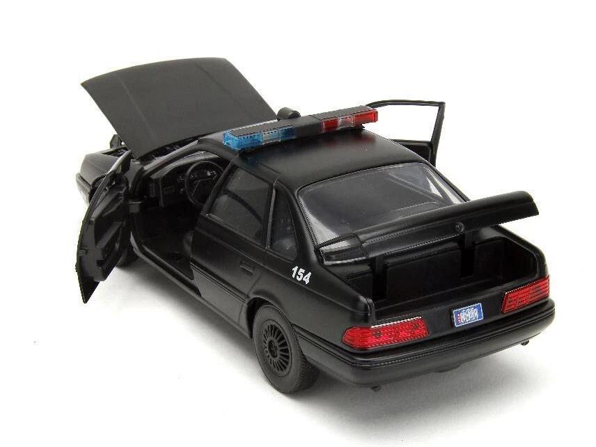 Jada Toys Robocop - OCP Ford Taurus With Robocop Figure Hollywood Rides 1:24 Scale Die Cast Vehicle - Image 4